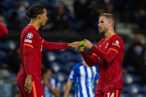 PORTO, PORTUGAL - Tuesday, September 28, 2021: Liverpool's captain Jordan Henderson hands over the captain's armband to Virgil van Dijk (L) during the UEFA Champions League Group B Matchday 2 game between FC Porto and Liverpool FC at the Estádio do Dragão. Liverpool won 5-1. (Pic by David Rawcliffe/Propaganda)