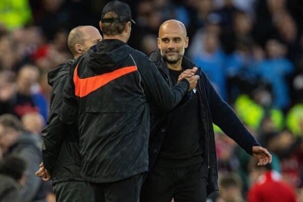 LIVERPOOL, ENGLAND - Sunday, October 3, 2021: Manchester City's manager Josep 'Pep' Guardiola shakes hands with Liverpool's manager Jürgen Klopp during the FA Premier League match between Liverpool FC and Manchester City FC at Anfield. The game ended in a 2-2 draw. (Pic by David Rawcliffe/Propaganda)