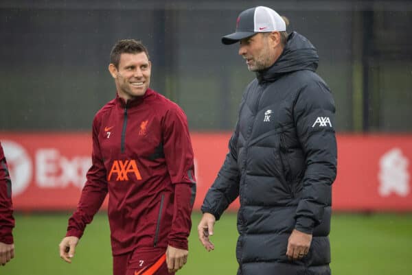 LIVERPOOL, ENGLAND - Monday, October 18, 2021: Liverpool's manager Jürgen Klopp (R) chats with James Milner (L) during a training session at the AXA Training Centre ahead of the UEFA Champions League Group B Matchday 3 game between Club Atlético de Madrid and Liverpool FC. (Pic by David Rawcliffe/Propaganda)