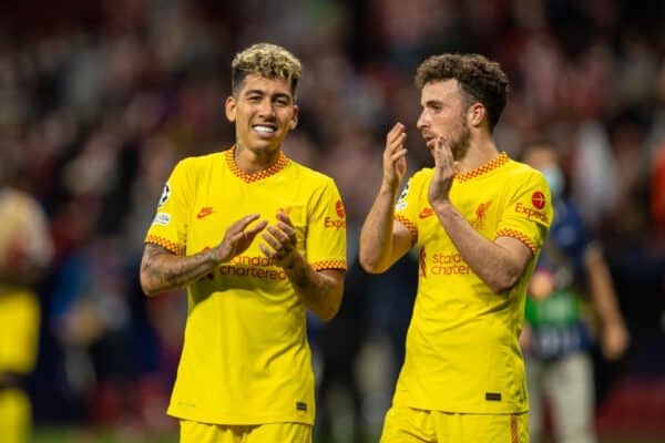 MADRID, SPAIN - Tuesday, October 19, 2021: Liverpool's Roberto Firmino (L) and Diogo Jota (R) celebrate after the UEFA Champions League Group B Matchday 3 game between Club Atlético de Madrid and Liverpool FC at the Estadio Metropolitano. Liverpool won 3-2. (Pic by David Rawcliffe/Propaganda)