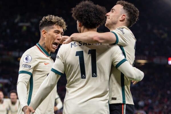 MANCHESTER, ENGLAND - Sunday, October 24, 2021: Liverpool's Mohamed Salah (C) celebrates with team-mates Roberto Firmino (L) abd Diogo Jota (R) after scoring the fifth goal, completing his hat-trick, during the FA Premier League match between Manchester United FC and Liverpool FC at Old Trafford. Liverpool won 5-0. (Pic by David Rawcliffe/Propaganda)