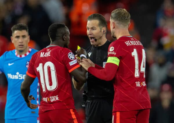 LIVERPOOL, ENGLAND - Wednesday, November 3, 2021: Liverpool's Sadio Mané (L) is shown a yellow card by referee Danny Makkelie during the UEFA Champions League Group B Matchday 4 game between Liverpool FC and Club Atlético de Madrid at Anfield. Liverpool won 2-0. (Pic by David Rawcliffe/Propaganda)