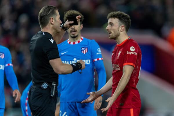 LIVERPOOL, ENGLAND - Wednesday, November 3, 2021: Liverpool's Diogo Jota (R) is shown a yellow card by referee Danny Makkelie during the UEFA Champions League Group B Matchday 4 game between Liverpool FC and Club Atlético de Madrid at Anfield. Liverpool won 2-0. (Pic by David Rawcliffe/Propaganda)