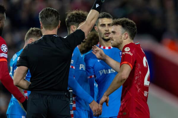 LIVERPOOL, ENGLAND - Wednesday, November 3, 2021: Liverpool's Diogo Jota (R) is shown a yellow card by referee Danny Makkelie during the UEFA Champions League Group B Matchday 4 game between Liverpool FC and Club Atlético de Madrid at Anfield. Liverpool won 2-0. (Pic by David Rawcliffe/Propaganda)