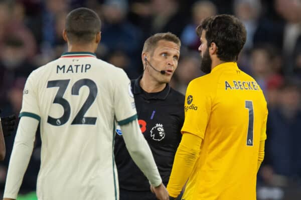 LONDON, ENGLAND - Sunday, November 7, 2021: Referee Craig Pawson speaks with goalkeeper Alisson Becker after awarding West Ham United's opening goal during the FA Premier League match between West Ham United FC and Liverpool FC at the London Stadium. West Ham United won 3-2. (Pic by David Rawcliffe/Propaganda)