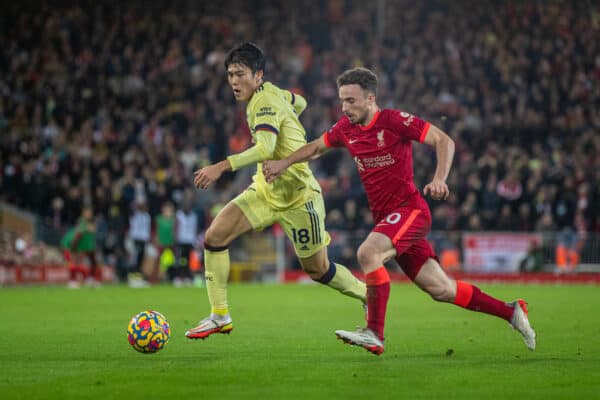 LIVERPOOL, ENGLAND - Saturday, November 20, 2021: Arsenal's Takehiro Tomiyasu (L) and Liverpool's Diogo Jota during the FA Premier League match between Liverpool FC and Arsenal FC at Anfield. (Pic by David Rawcliffe/Propaganda)