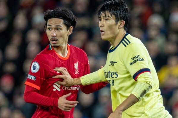 LIVERPOOL, ENGLAND - Saturday, November 20, 2021: Liverpool's Takumi Minamino (L) and his Japan international team-mate Arsenal's Takehiro Tomiyasu during the FA Premier League match between Liverpool FC and Arsenal FC at Anfield. (Pic by David Rawcliffe/Propaganda)