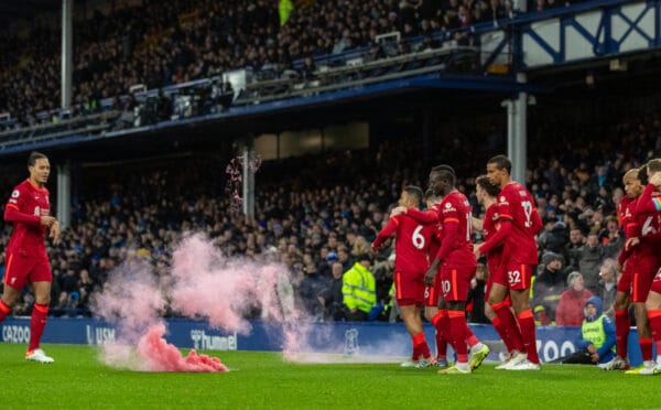 LIVERPOOL, ENGLAND - Wednesday, December 1, 2021: A red smoke bomb is thrown onto the pitch as Liverpool players celebrate the third goal during the FA Premier League match between Everton FC and Liverpool FC, the 239th Merseyside Derby, at Goodison Park. Liverpool won 4-1. (Pic by David Rawcliffe/Propaganda)