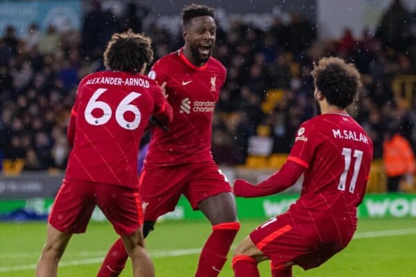 WOLVERHAMPTON, ENGLAND - Saturday, December 4, 2021: Liverpool's Divock Origi (C) celebrates with team-mates Trent Alexander-Arnold (L) and Mohamed Salah (R) after scoring an injury time winning goal during the FA Premier League match between Wolverhampton Wanderers FC and Liverpool FC at Molineux Stadium. Liverpool won 1-0. (Pic by David Rawcliffe/Propaganda)