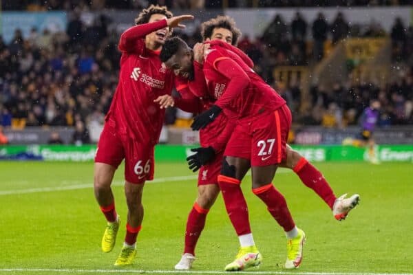 WOLVERHAMPTON, ENGLAND - Saturday, December 4, 2021: Liverpool's Divock Origi (C) celebrates with team-mates Trent Alexander-Arnold (L) and Mohamed Salah (R) after scoring an injury time winning goal during the FA Premier League match between Wolverhampton Wanderers FC and Liverpool FC at Molineux Stadium. Liverpool won 1-0. (Pic by David Rawcliffe/Propaganda)