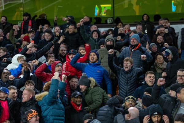 WOLVERHAMPTON, ENGLAND - Saturday, December 4, 2021: Liverpool supporters celebrate after an injury time winning goal during the FA Premier League match between Wolverhampton Wanderers FC and Liverpool FC at Molineux Stadium. Liverpool won 1-0. (Pic by David Rawcliffe/Propaganda)