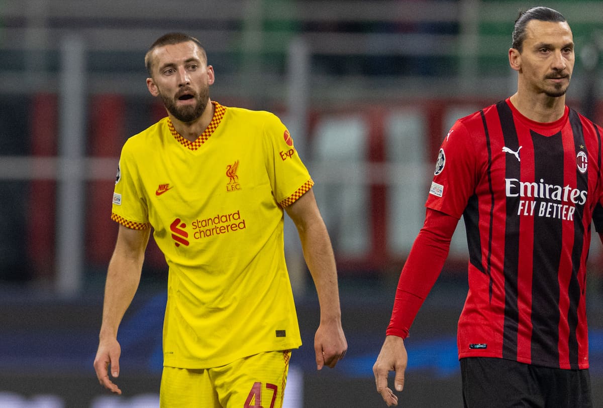 MILAN, ITALY - Tuesday, December 7, 2021: Liverpool's Nathaniel Phillips (L) and AC Milan's 40-year-old Zlatan Ibrahimovic? during the UEFA Champions League Group B Matchday 6 game between AC Milan and Liverpool FC at the Stadio San Siro. Liverpool won 2-1. (Pic by David Rawcliffe/Propaganda)