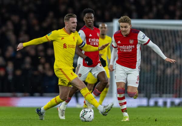 LONDON, ENGLAND - Thursday, January 20, 2022: Liverpool's captain Jordan Henderson (L) challenges Arsenal's Martin Ødegaard during the Football League Cup Semi-Final 2nd Leg match between Arsenal FC and Liverpool FC at the Emirates Stadium. Liverpool won 2-0, 2-0 on aggregate. (Pic by David Rawcliffe/Propaganda)