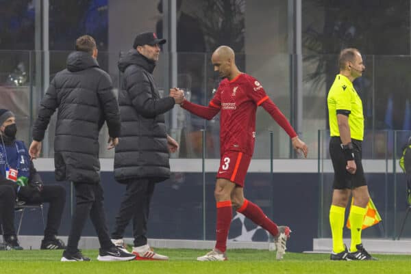 MILAN, ITALY - Tuesday, February 15, 2022: Liverpool's Fabio Henrique Tavares 'Fabinho' shakes hands with manager Jürgen Klopp as he is substituted during the UEFA Champions League Round of 16 1st Leg game between FC Internazionale Milano and Liverpool FC at the Stadio San Siro. Liverpool won 2-0. (Pic by David Rawcliffe/Propaganda)