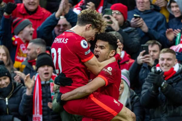 LIVERPOOL, ENGLAND - Saturday, February 19, 2022: Liverpool's Luis Díaz (R) celebrates with team-mate Kostas Tsimikas after scoring the third goal during the FA Premier League match between Liverpool FC and Norwich City FC at Anfield. Liverpool won 3-1. (Pic by David Rawcliffe/Propaganda)