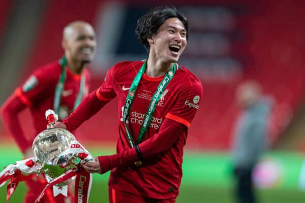 LONDON, ENGLAND - Sunday, February 27, 2022: Liverpool's Takumi Minamino celebrates with the trophy after the Football League Cup Final match between Chelsea FC and Liverpool FC at Wembley Stadium. Liverpool won 11-10 on penalties after a goal-less draw. (Pic by David Rawcliffe/Propaganda)