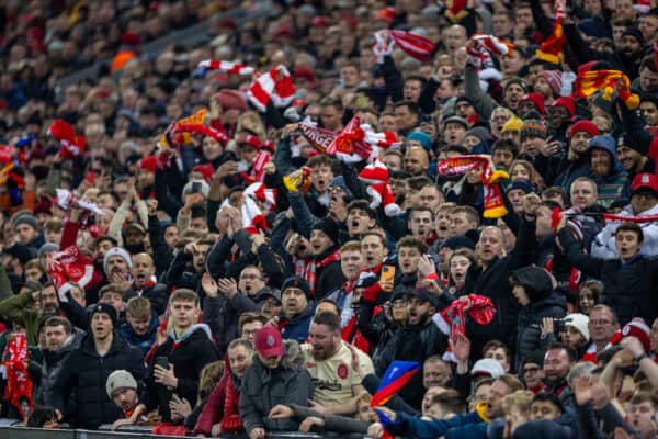 Liverpool fans with scarves sing Allez Allez Allez (Pic by David Rawcliffe/Propaganda)