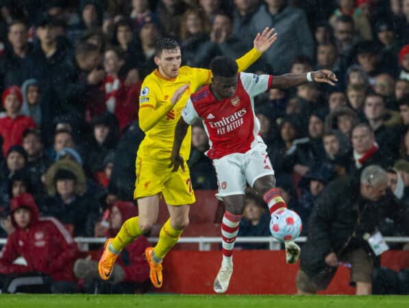 LONDON, ENGLAND - Wednesday, March 16, 2022: Liverpool's Andy Robertson (L) challenges Arsenal's Bukayo Saka during the FA Premier League match between Arsenal FC and Liverpool FC at the Emirates Stadium. Liverpool won 2-0. (Pic by David Rawcliffe/Propaganda)
