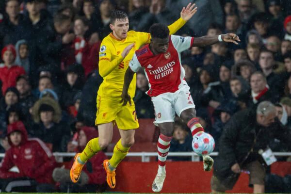 LONDON, ENGLAND - Wednesday, March 16, 2022: Liverpool's Andy Robertson (L) challenges Arsenal's Bukayo Saka during the FA Premier League match between Arsenal FC and Liverpool FC at the Emirates Stadium. Liverpool won 2-0. (Pic by David Rawcliffe/Propaganda)