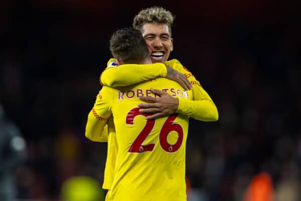 LONDON, ENGLAND - Wednesday, March 16, 2022: Liverpool's goal-scorer Roberto Firmino (R) celebrates with team-mate Andy Robertson after the FA Premier League match between Arsenal FC and Liverpool FC at the Emirates Stadium. Liverpool won 2-0. (Pic by David Rawcliffe/Propaganda)