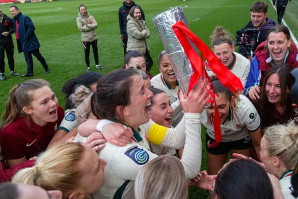 BRISTOL, ENGLAND - Sunday, April 3, 2022: Liverpool’s captain Niamh Fahey raises a supporter’s home made trophy as they celebrate after being crowned Champions after the FA Women’s Championship Round 20 match between Bristol City FC Women and Liverpool FC Women at Ashton Gate. Liverpool won 4-2. (Pic by Geoff Caddick/Propaganda)