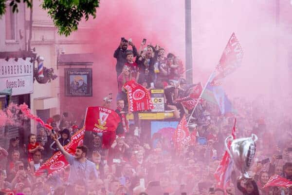 LIVERPOOL, ENGLAND - Sunday, May 29, 2022: Liverpool supporters celebrate during an open top bus parade around the city after the club won the Cup Double, the FA Cup and the Football League Cup. (Photo by David Rawcliffe/Propaganda)