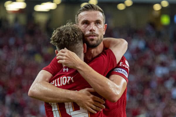 SINGAPORE - Friday, July 15, 2022: Liverpool's captain Jordan Henderson (R) celebrates with team-mate Harvey Elliott after scoring the first goal during the Standard Chartered Singapore Trophy pre-season friendly match between Liverpool FC and Crystal Palace FC at the Singapore National Stadium. Liverpool won 2-0. (Pic by David Rawcliffe/Propaganda)