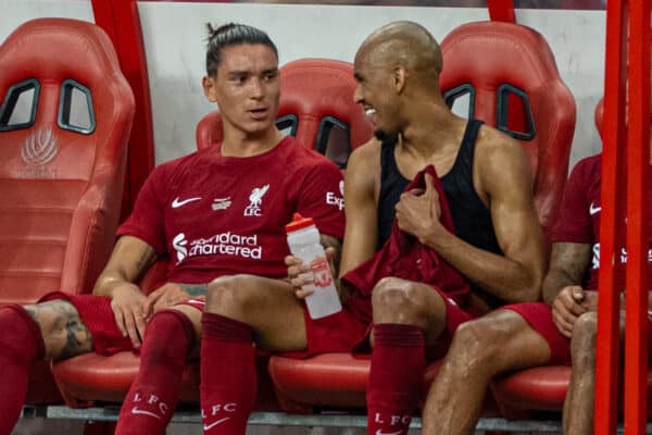 SINGAPORE - Friday, July 15, 2022: Liverpool's Darwin Núñez (L) sits on the bench with Fabio Henrique Tavares 'Fabinho' during the Standard Chartered Singapore Trophy pre-season friendly match between Liverpool FC and Crystal Palace FC at the Singapore National Stadium. Liverpool won 2-0. (Pic by David Rawcliffe/Propaganda)