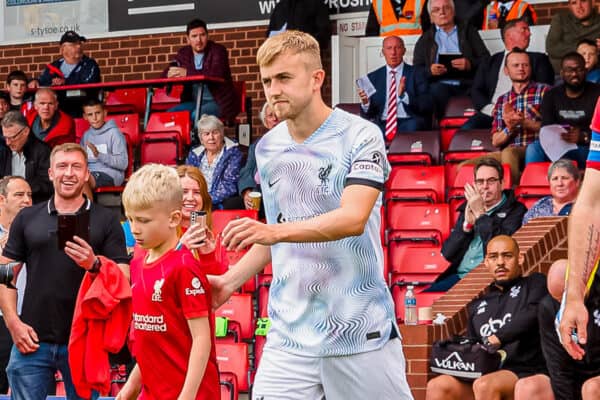 KIDDERMINSTER, ENGLAND - Friday, July 22, 2022: Liverpool's Jack Cain (L) leads his side out before a pre-season Under-21's friendly between Kidderminster Harriers FC and Liverpool FC Under-21's at Aggborough Stadium. (Pic by Peter Hinkley/Propaganda)