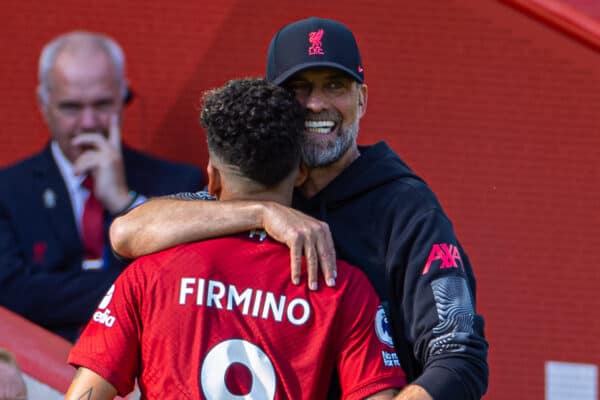 LIVERPOOL, ENGLAND - Saturday, August 27, 2022: Liverpool's Roberto Firmino is embraces by manager Jürgen Klopp as he is substituted during the FA Premier League match between Liverpool FC and AFC Bournemouth at Anfield. Liverpool won 9-0. (Pic by David Rawcliffe/Propaganda)