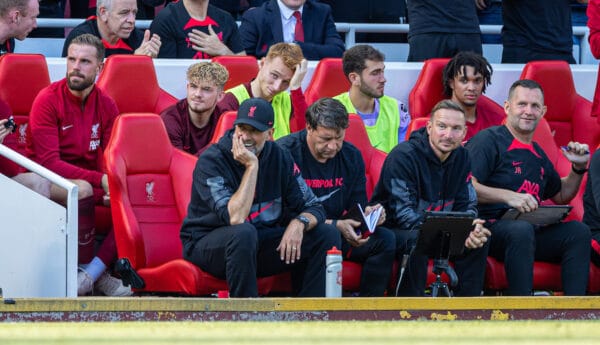 LIVERPOOL, ENGLAND - Saturday, August 27, 2022: Liverpool's manager Jürgen Klopp (L) laughs on the bench as his side score a ninth goal during the FA Premier League match between Liverpool FC and AFC Bournemouth at Anfield. Liverpool won 9-0. (Pic by David Rawcliffe/Propaganda)