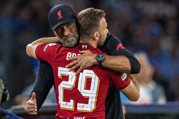 NAPLES, ITALY - Wednesday, September 7, 2022: Liverpool's substitute Arthur Melo is embraced by manager Jürgen Klopp before making his debut during the UEFA Champions League Group A matchday 1 game between SSC Napoli and Liverpool FC at the Stadio Diego Armando Maradona. Napoli won 4-1. (Pic by David Rawcliffe/Propaganda)