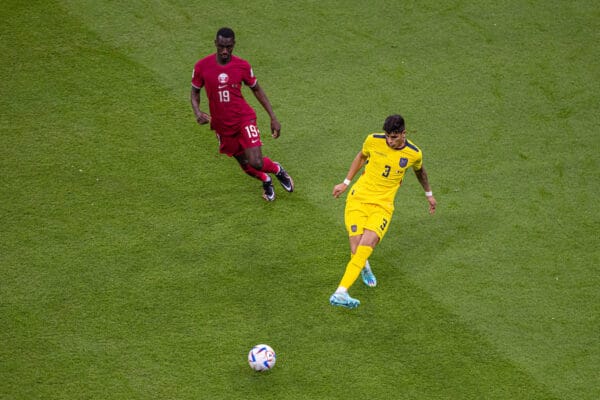 DOHA, QATAR - Sunday, November 20, 2022: Ecuador's Piero Hincapié (R) and Qatar's Almoez Ali during the opening game of the FIFA World Cup Qatar 2022 Group A Qatar against Ecuador at the Al Bayt Stadium. Ecuador won 2-0. (Pic by David Rawcliffe/Propaganda)