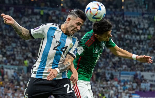 DOHA, QATAR - Saturday, November 26, 2022: Argentina's Enzo Fernández (L) heads the ball clear during the FIFA World Cup Qatar 2022 Group C match between Argentina and Mexico at the Lusail Stadium. Argentina won 2-0. (Pic by David Rawcliffe/Propaganda)