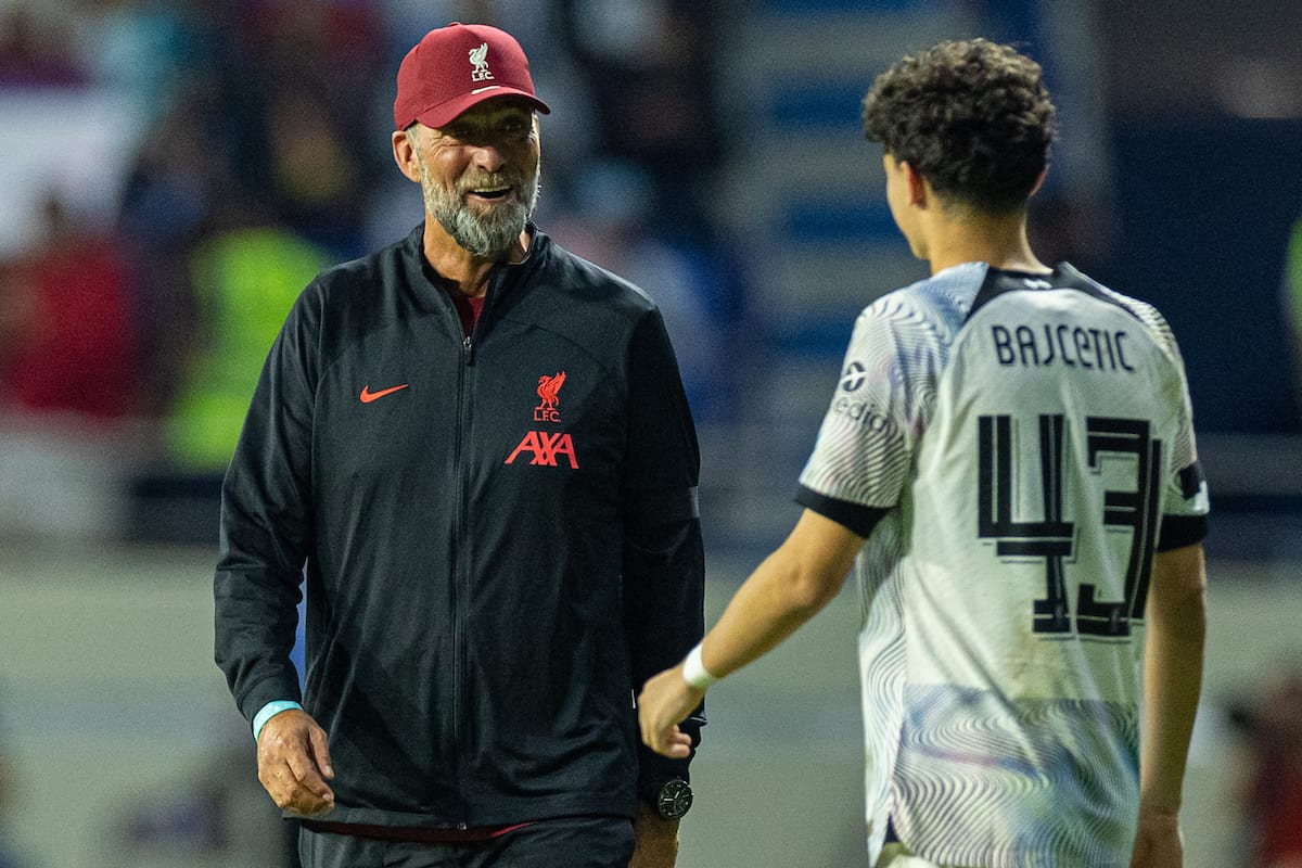 DUBAI, UNITED ARAB EMIRATES - Friday, December 16, 2022: Liverpool's manager Jürgen Klopp (R) with Stefan Bajcetic after the Dubai Super Cup 2022 match between Liverpool FC and AC Milan at the Al Maktoum Stadium. Liverpool won 4-1 but lost the extra-point penalty shoot-out 4-3. (Pic by David Rawcliffe/Propaganda)