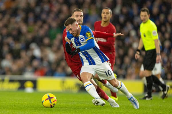 BRIGHTON & HOVE, ENGLAND - Saturday, January 14, 2023: Brighton & Hove Albion's Alexis Mac Allister gets away from Liverpool's captain Jordan Henderson during the FA Premier League match between Brighton & Hove Albion FC and Liverpool FC at the Falmer Stadium. (Pic by David Rawcliffe/Propaganda)