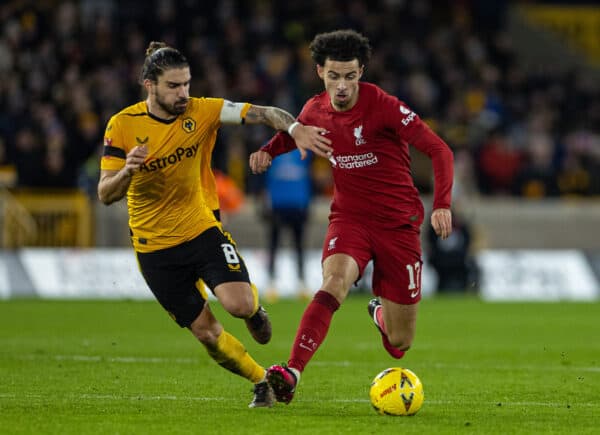 WOLVERHAMPTON, ENGLAND - Tuesday, January 17, 2023: Liverpool's Curtis Jones (R) is challenged by Wolverhampton Wanderers' captain Rúben Neves during the FA Cup 3rd Round Replay match between Wolverhampton Wanderers FC and Liverpool FC at Molineux Stadium. Liverpool won 1-0. (Pic by David Rawcliffe/Propaganda)