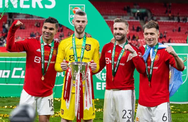 LONDON, ENGLAND - Sunday, February 26, 2023: Manchester United's (L-R) Carlos Henrique Casimiro, goalkeeper David de Gea, Luke Shaw and Lisandro Martínez celebrate with the trophy after the Football League Cup Final match between Manchester United FC and Newcastle United FC at Wembley Stadium. Man Utd won 2-0. (Pic by David Rawcliffe/Propaganda)