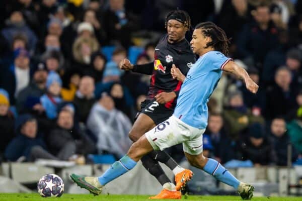 MANCHESTER, ENGLAND - Tuesday, March 14, 2023: RB Leipzig's Mohamed Simakan (L) is challenged by Manchester City's Nathan Aké during the UEFA Champions League Round of 16 2nd Leg match between Manchester City FC and RB Leipzig at the City of Manchester Stadium. Man City won 7-0, 8-1 on aggregate. (Pic by Jessica Hornby/Propaganda)