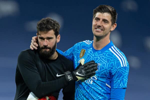 MADRID, SPAIN - Wednesday, March 15, 2023: Liverpool's goalkeeper Alisson Becker (L) with Real Madrid's goalkeeper Thibaut Courtois after the UEFA Champions League Round of 16 2nd Leg game between Real Madrid CF and Liverpool FC at the Estadio Santiago Bernabéu. Madrid won 1-0 (6-2 on aggregate). (Pic by David Rawcliffe/Propaganda)