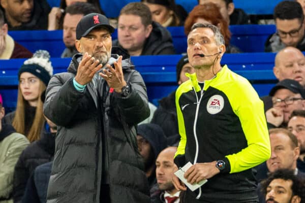 LONDON, ENGLAND - Tuesday, April 4, 2023: Liverpool's manager Jürgen Klopp speaks with fourth official referee Andre Marriner during the FA Premier League match between Chelsea FC and Liverpool FC at Stamford Bridge. (Pic by David Rawcliffe/Propaganda)