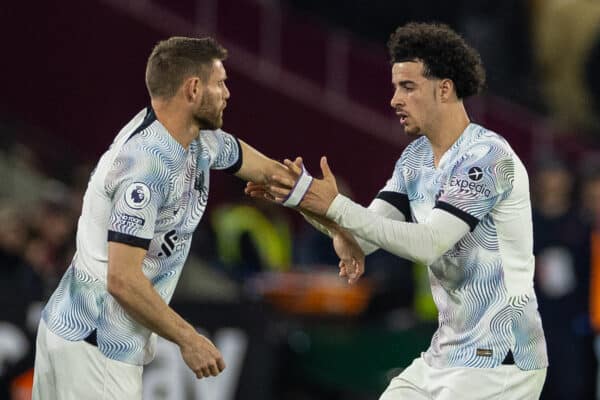 LONDON, ENGLAND - Wednesday, April 26, 2023: Liverpool's Curtis Jones puts the captain's armband onto substitute James Milner during the FA Premier League match between West Ham United FC and Liverpool FC at the London Stadium. Liverpool won 2-1. (Pic by David Rawcliffe/Propaganda)