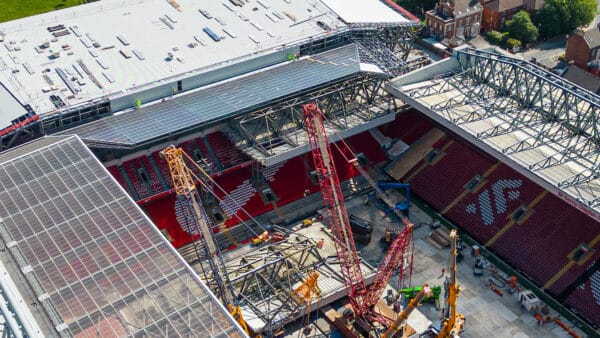 LIVERPOOL, ENGLAND - Tuesday, May 30, 2023: An aerial view of Anfield, the home stadium of Liverpool Football Club, showing the ongoing construction of the new Anfield Road expansion. Cranes have been installed on the pitch as the  redevelopment phase begins to remove the roof of the old stand. The roof has been cut into sections and the first half has already been removed and sits on the pitch. The development will see and extra 7,000 more seats added taking Anfield's overall capacity to more than 61,000. (Pic by David Rawcliffe/Propaganda)