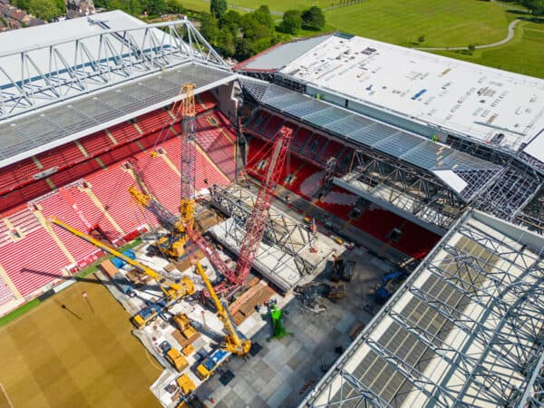 LIVERPOOL, ENGLAND - Tuesday, May 30, 2023: An aerial view of Anfield, the home stadium of Liverpool Football Club, showing the ongoing construction of the new Anfield Road expansion. Cranes have been installed on the pitch as the redevelopment phase begins to remove the roof of the old stand. The roof has been cut into sections and the first half has already been removed and sits on the pitch. The development will see and extra 7,000 more seats added taking Anfield's overall capacity to more than 61,000. (Pic by David Rawcliffe/Propaganda)