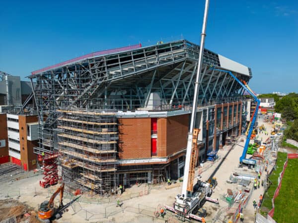 LIVERPOOL, ENGLAND - Tuesday, May 30, 2023: An aerial view of Anfield, the home stadium of Liverpool Football Club, showing the ongoing construction of the new Anfield Road expansion. Cranes have been installed on the pitch as the  redevelopment phase begins to remove the roof of the old stand. The roof has been cut into sections and the first half has already been removed and sits on the pitch. The development will see and extra 7,000 more seats added taking Anfield's overall capacity to more than 61,000. (Pic by David Rawcliffe/Propaganda)