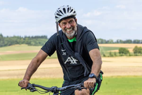 DONESCHINGEN, GERMANY - Monday, July 17, 2023: Liverpool's manager Jürgen Klopp (R) rides a bike back to the team hotel after a training session during the club's pre-season preparations in Germany. (Pic by David Rawcliffe/Propaganda)