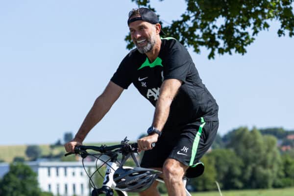 DONESCHINGEN, GERMANY - Tuesday, July 18, 2023: Liverpool's manager Jürgen Klopp rides to a training session on a bike during a pre-season training camp in Germany. (Pic by David Rawcliffe/Propaganda)
