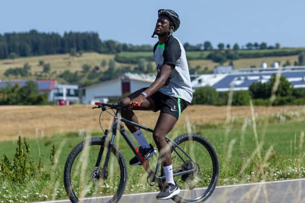 DONESCHINGEN, GERMANY - Tuesday, July 18, 2023: Liverpool's Ibrahima Konaté rides to a training session on a bike during a pre-season training camp in Germany. (Pic by David Rawcliffe/Propaganda)