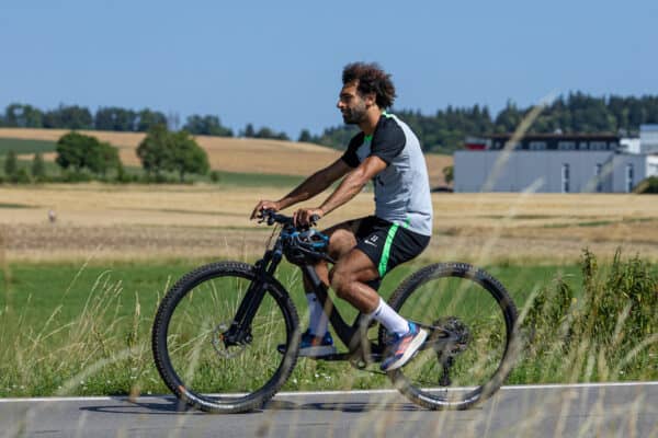 DONESCHINGEN, GERMANY - Tuesday, July 18, 2023: Liverpool's Mohamed Salah rides to a training session on a bike during a pre-season training camp in Germany. (Pic by David Rawcliffe/Propaganda)