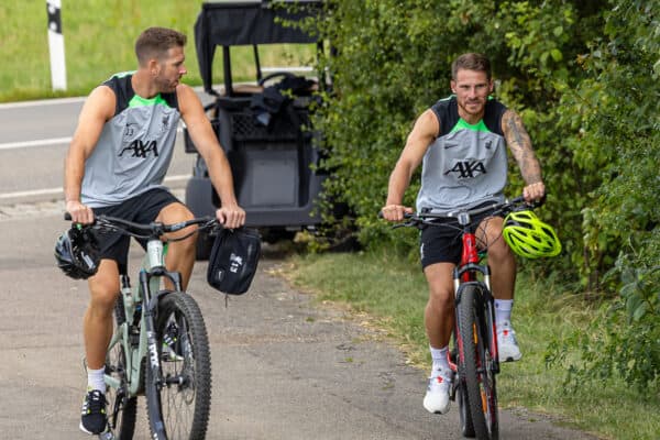 DONESCHINGEN, GERMANY - Saturday, July 22, 2023: Liverpool's Alexis Mac Allister (R) and goalkeeper Adrián San Miguel del Castillo ride back to the team hotel on bikes after a morning training session during a pre-season training camp in Germany. (Pic by David Rawcliffe/Propaganda)